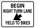 begin right turn lane sign