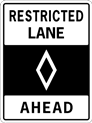 restricted lane ahead sign