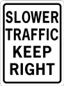 slower traffic keep right sign